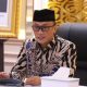"Ilustrasi tenaga honorer yang menghadapi ketidakpastian akibat kebijakan reformasi kepegawaian 2025.